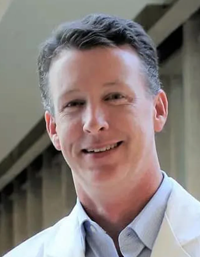 Dr Scott Commins